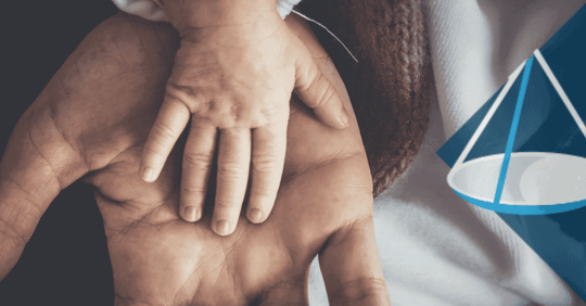 child hand in parents