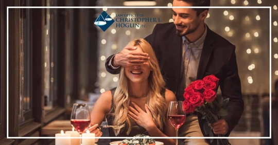 guy hiding girls face with surprise roses