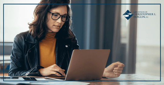 girl looking at computer